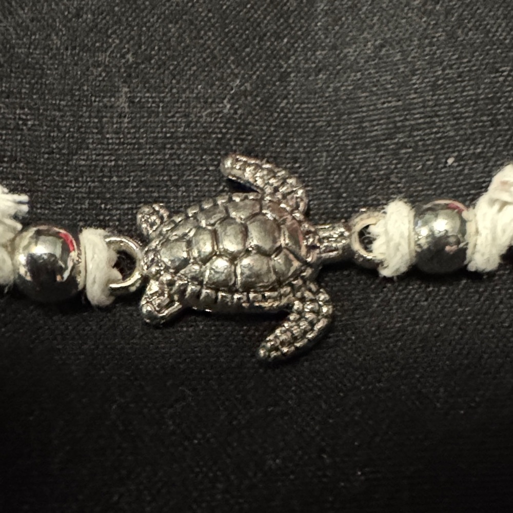 Silver Turtle Charm on White Bracelet - Picture 2 of 3
